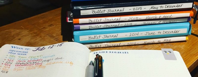 Photo of my stack of Bullet Journal notebooks