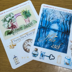 A photo of two sheets of stickers celebrating new year 2026